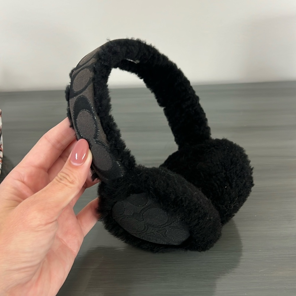 Black monogram Coach shearling earmuffs